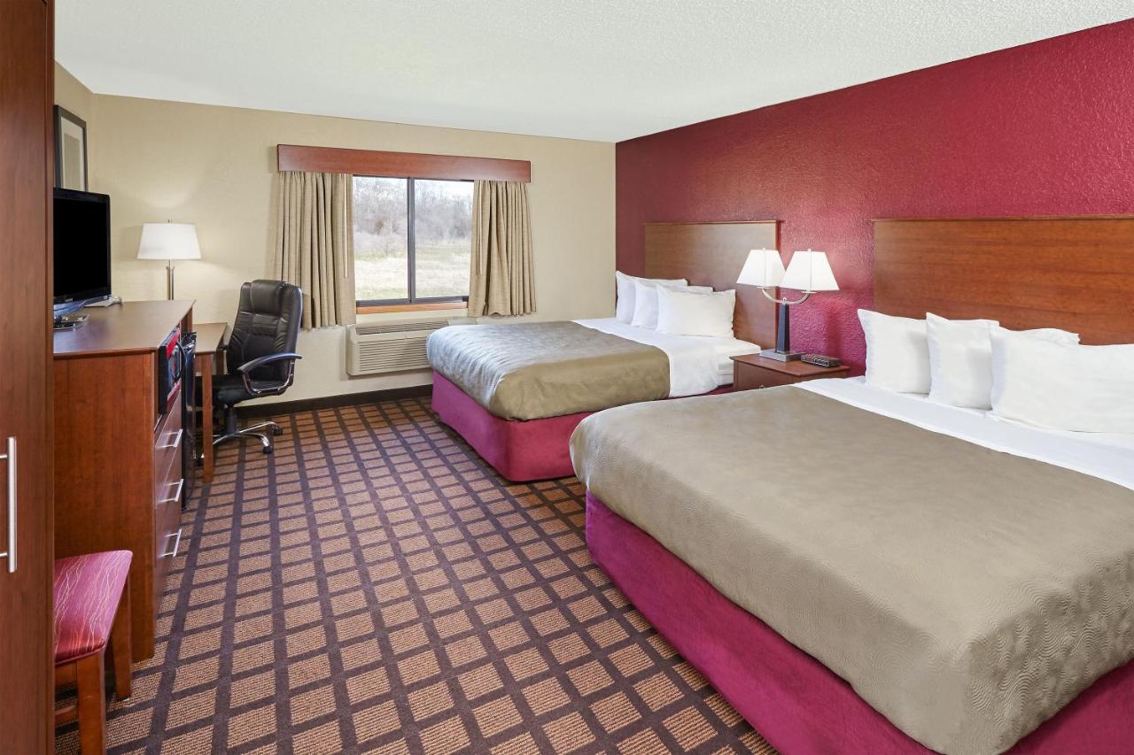 Queen Room with Two Queen Beds - Non-Smoking at AmericInn by Wyndham Burlington