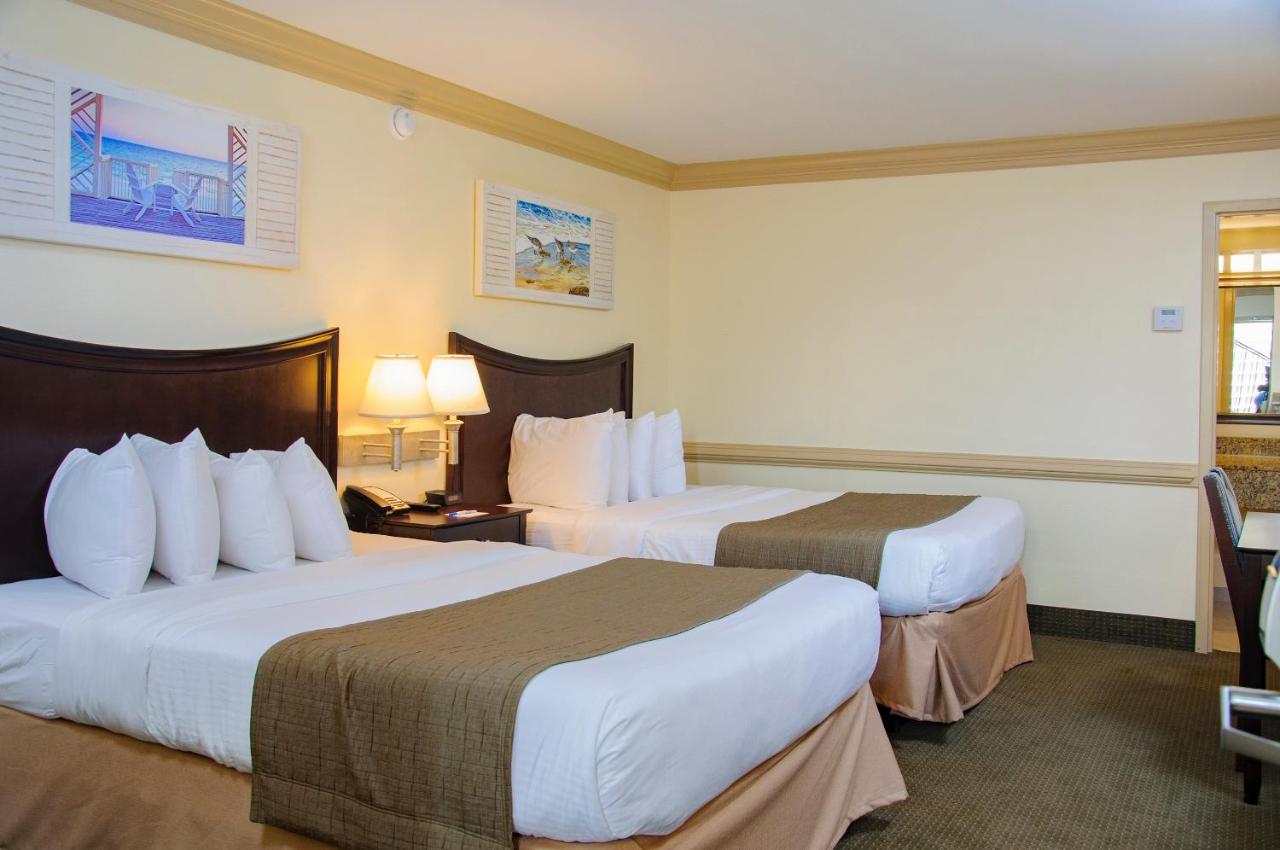 Parking/Pool View with Two Queen Beds - Main Building at Shutters on the Banks