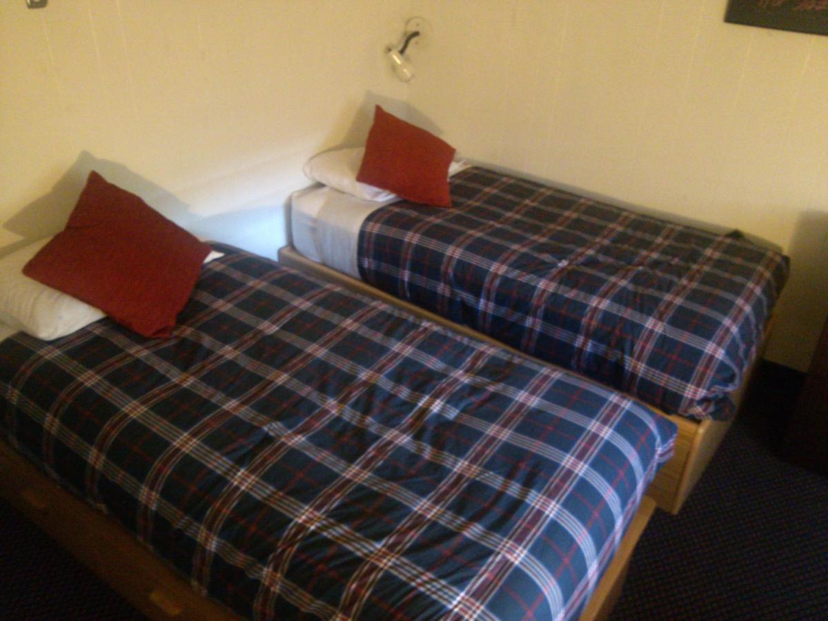 Twin Dormitory Room with Shared Bathroom at St. Moritz Lodge & Condominiums