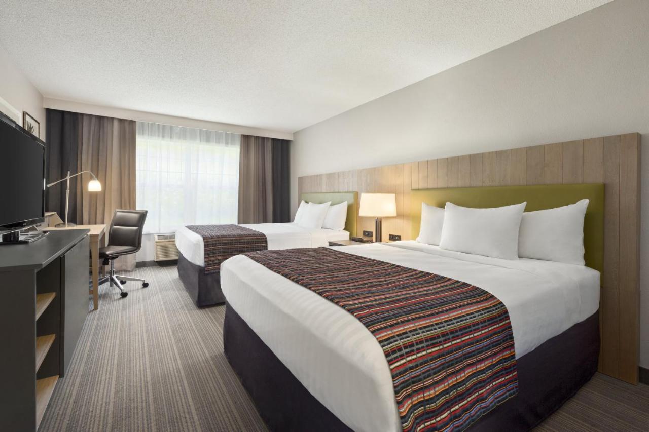 Queen Room with Two Queen Beds at Country Inn & Suites by Radisson, Decorah, IA