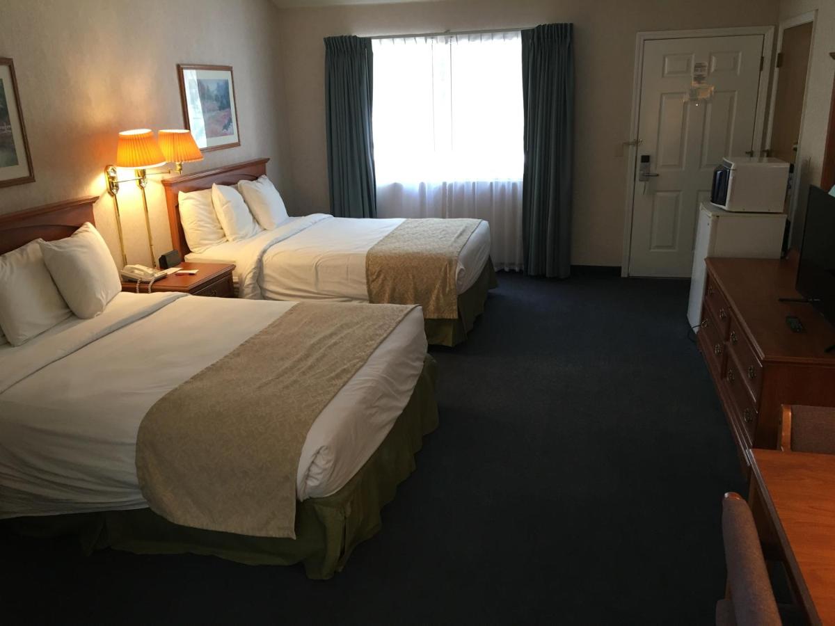 Queen Room with Two Queen Beds at Garden Inn and Suites