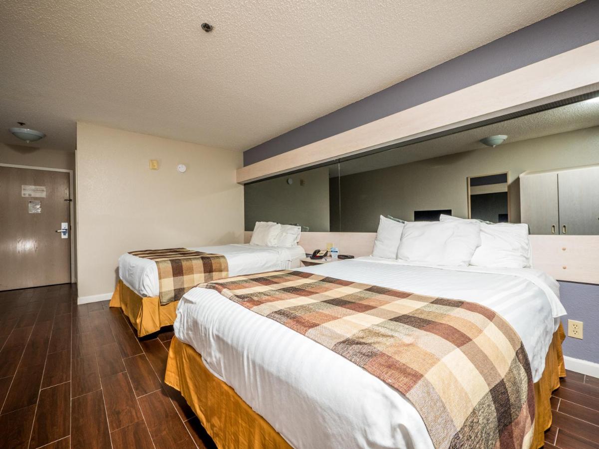 Queen Room with Two Queen Beds - Non-Smoking at Microtel Inn & Suites by Wyndham Palm Coast I-95