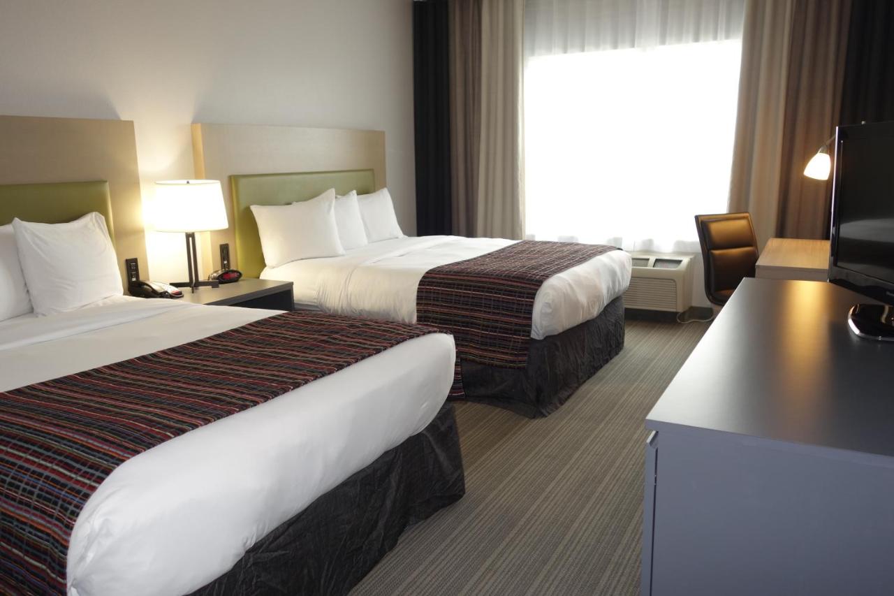 Queen Room with Two Queen Beds - Disability Access/Non-Smoking, Non-Pet Friendly at Country Inn & Suites by Radisson, Coralville, IA