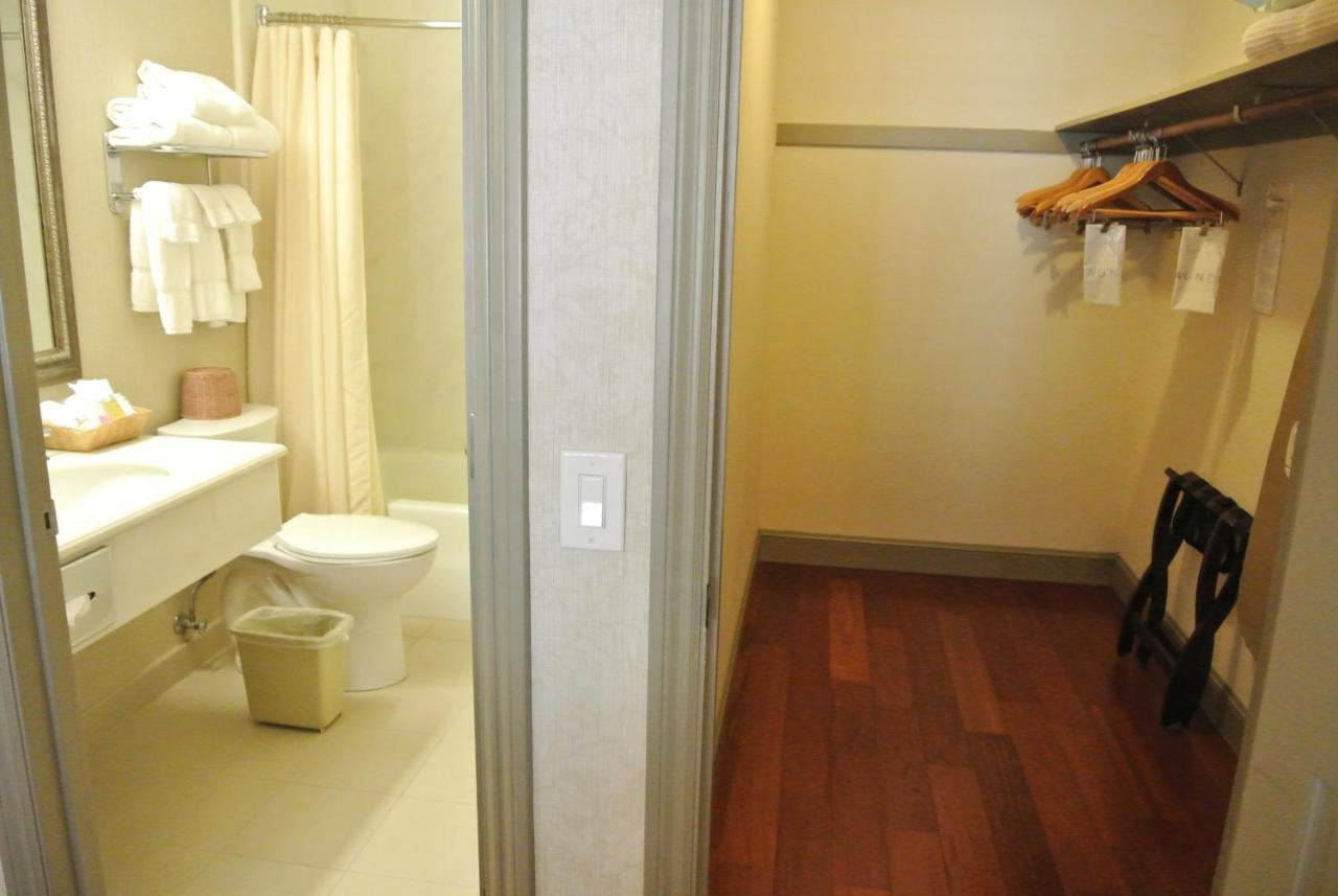 Two-Bedroom Suite with Two Double Beds and One Queen Bed at Cow Hollow Inn & Suites