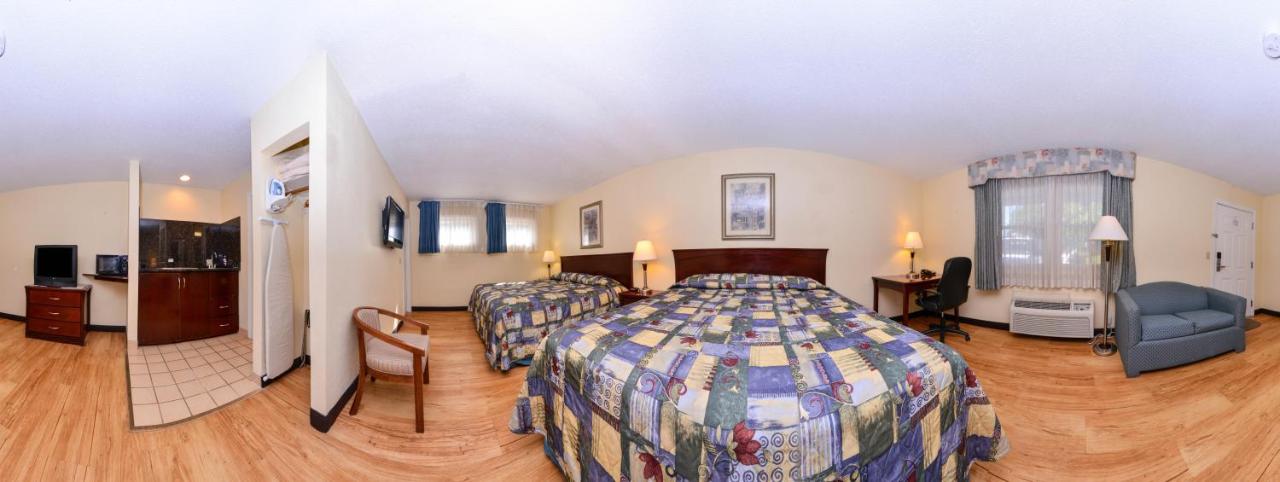 King Suite with Two King Beds and Sofa Bed  at Tower Inn And Suites Of Guilford - Madison