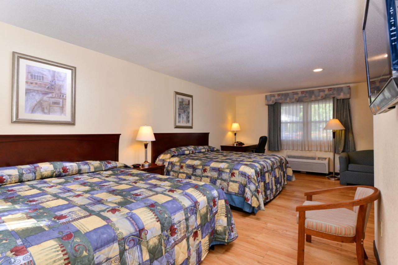 King Suite with Two King Beds and Sofa Bed  at Tower Inn And Suites Of Guilford - Madison