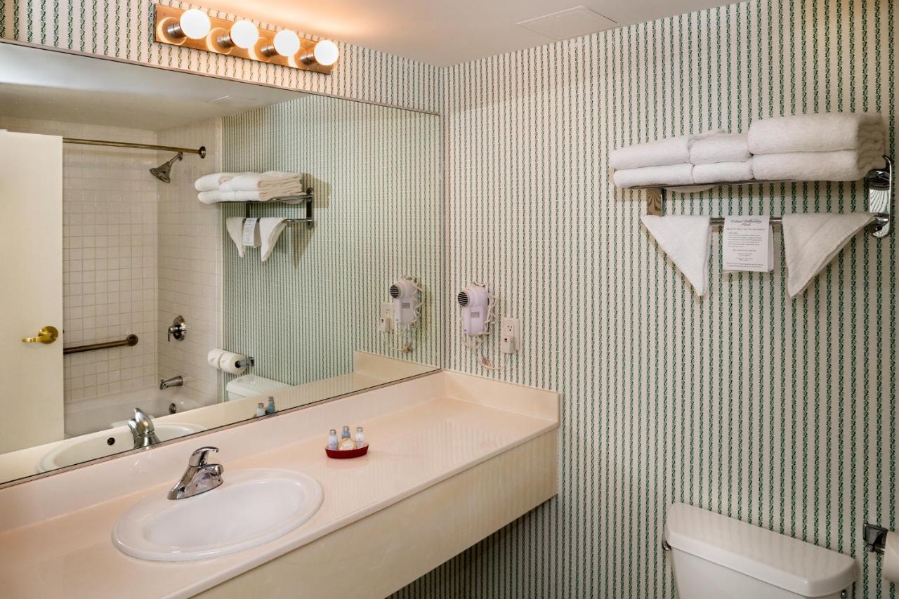 King Suite with Sofa Bed at Williamsburg Woodlands Hotel & Suites, an official Colonial Williamsburg Hotel