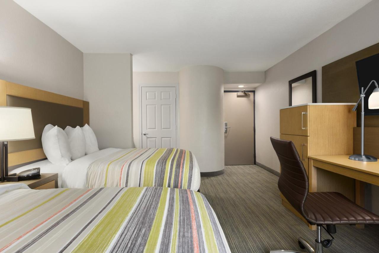 Guest Room with Two Double Beds at Country Inn & Suites by Radisson, San Antonio Medical Center, TX