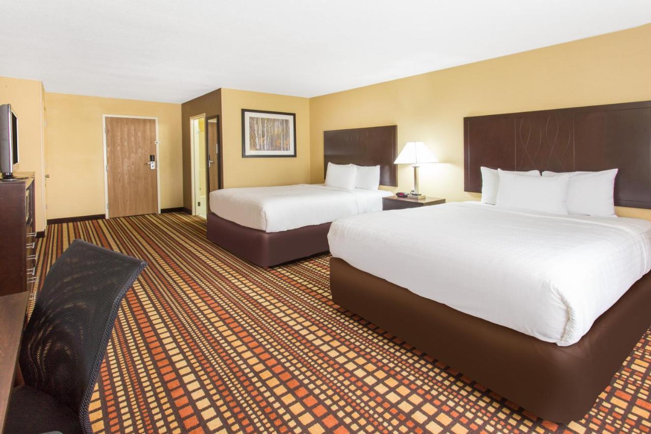 Queen Room with Two Queen Beds - Non-Smoking at Days Inn & Suites by Wyndham Davenport East