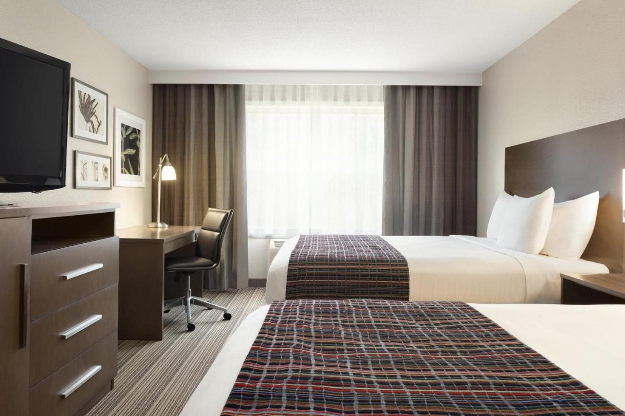 Queen Room with Two Queen Beds at Country Inn & Suites by Radisson, Platteville, WI