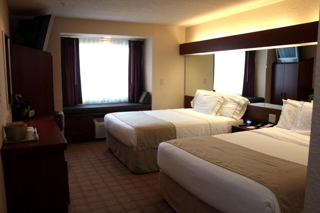 Queen Room with Two Queen Beds - Non-Smoking at Microtel Inn & Suites by Wyndham Jasper