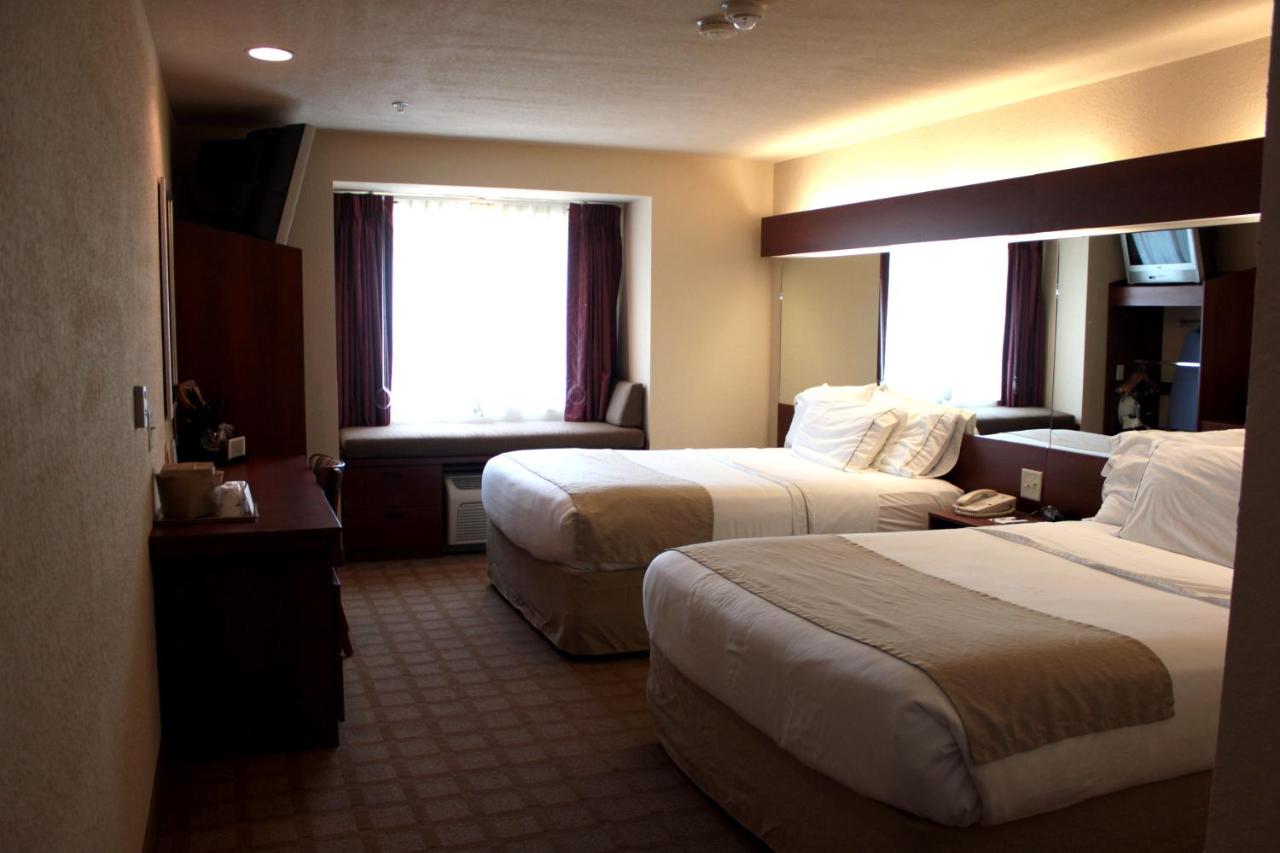 Queen Room with Two Queen Beds - Non-Smoking at Microtel Inn & Suites by Wyndham Jasper