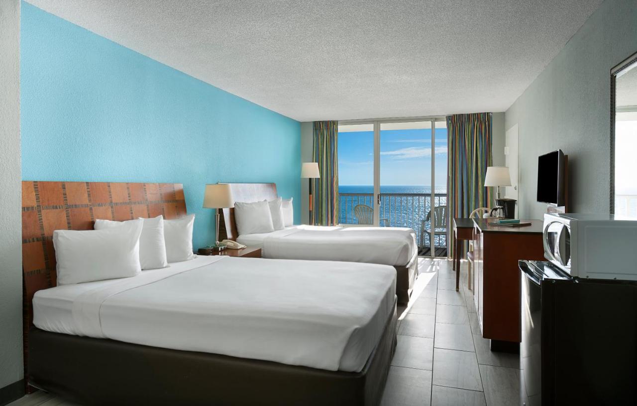 Oceanfront Room with Two Queen Beds at Crown Reef Beach Resort and Waterpark