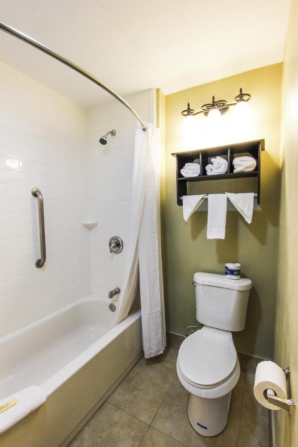 Junior Suite with Three Queen Beds - Non-Smoking at Beachcomber Resort & Club