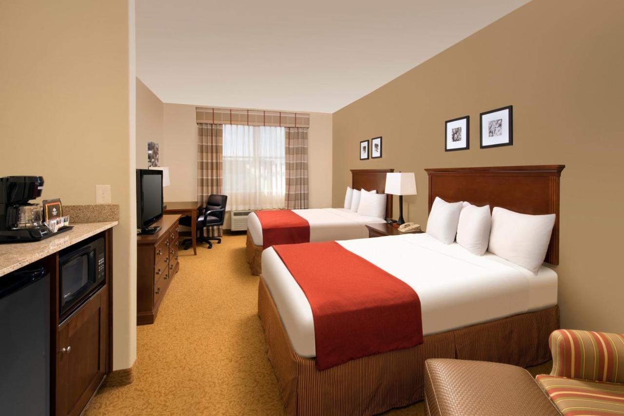 Queen Room with Two Queen Beds - Non-Smoking at Country Inn & Suites by Radisson, Houston Intercontinental Airport East, TX