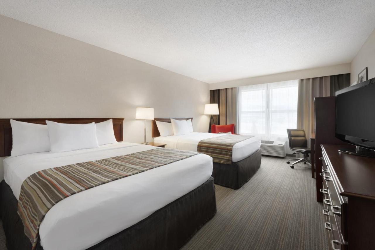 Queen Room with Two Queen Beds at Country Inn & Suites by Radisson, Houghton, MI