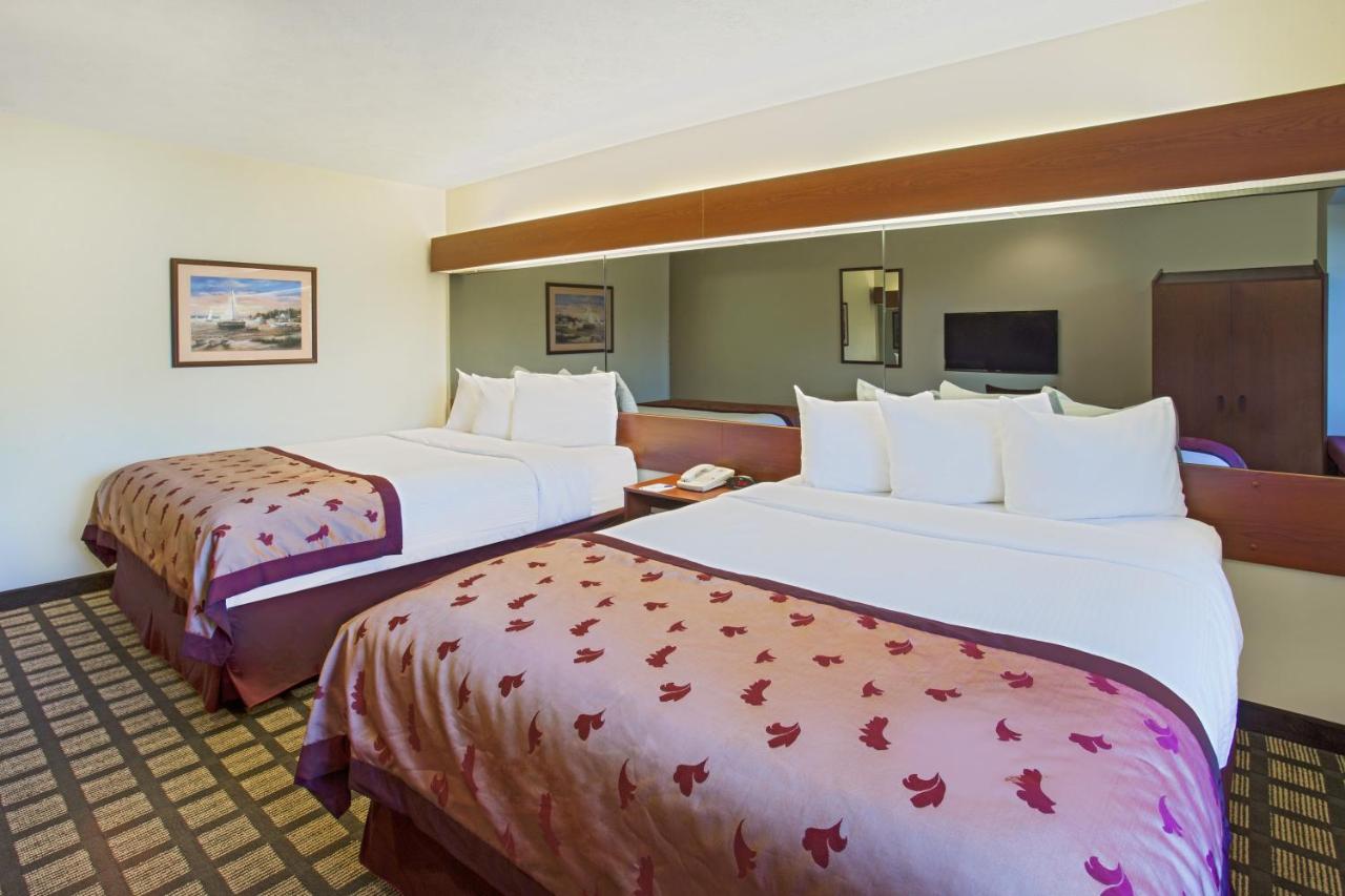 Queen Room with Two Queen Beds - Non-Smoking at Microtel Inn & Suites by Wyndham Holland