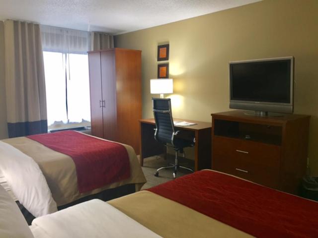 Queen Room with Two Queen Beds at Comfort Inn & Suites Airport - American Way