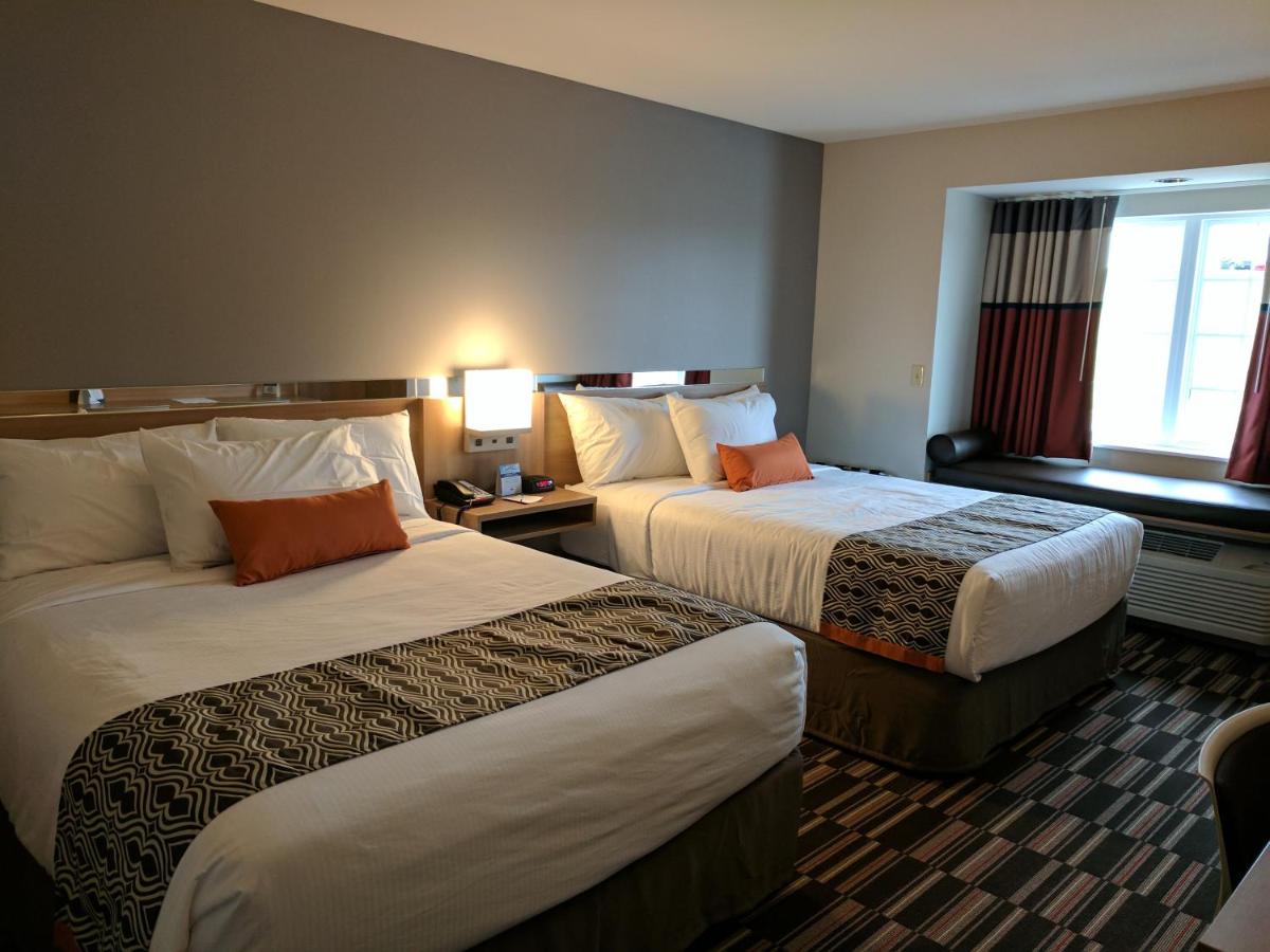 Queen Room with Two Queen Beds - Non-Smoking at Microtel Inn & Suites by Wyndham Clarion