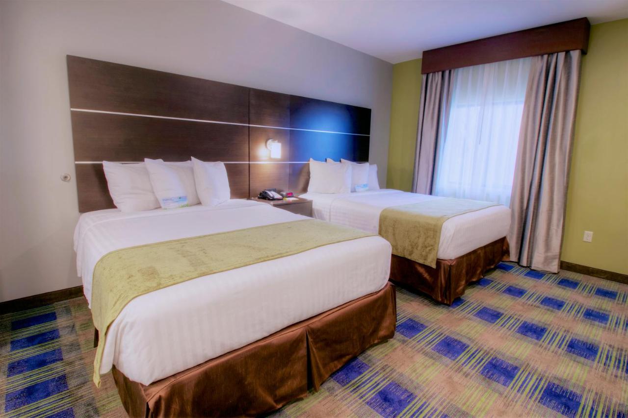 Standard Queen Room with Two Queen Beds at Days Inn & Suites by Wyndham Port Arthur